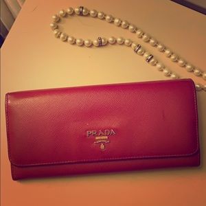 Prada red saffiano leather wallet 100% authentic